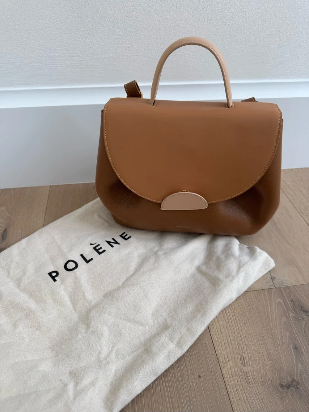 Polène tan and light-tan leather top-handle bag